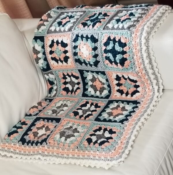 Peachy granny square blanket